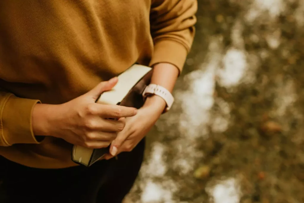 a Christian in the truest sense of the word, holding their Bible
