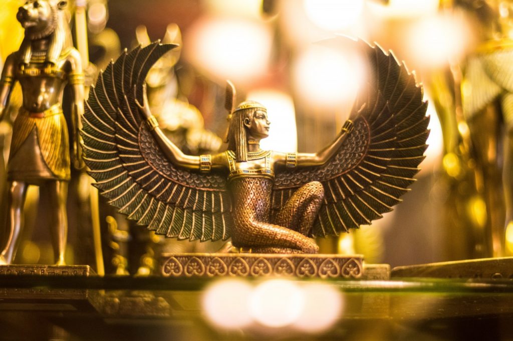 picture of winged woman figure made out of gold