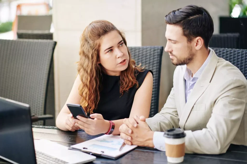 a male and female coworker, working. Are they work spouses?