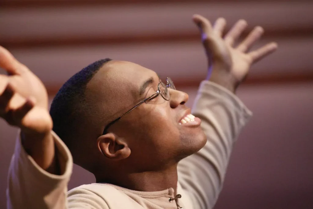 a man singing a worship song