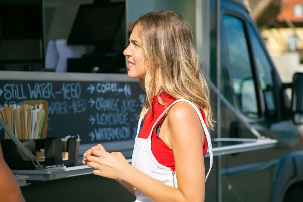 woman making a decision about ordering a coffee