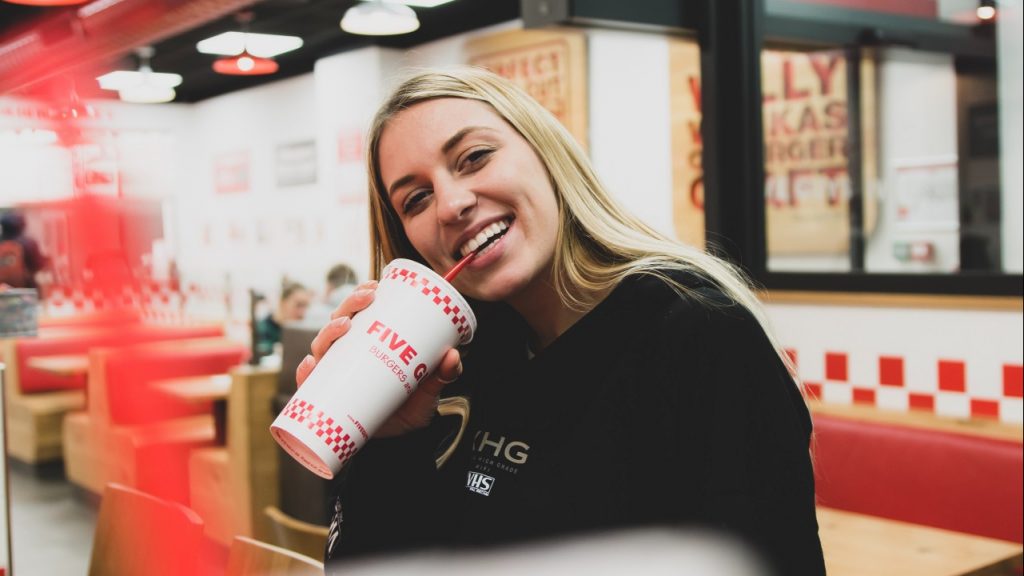 girl smiling at restaurant