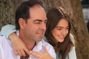 a young woman hugging her father
