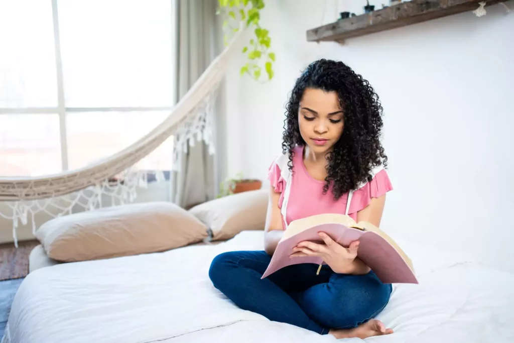 girl reading her bible