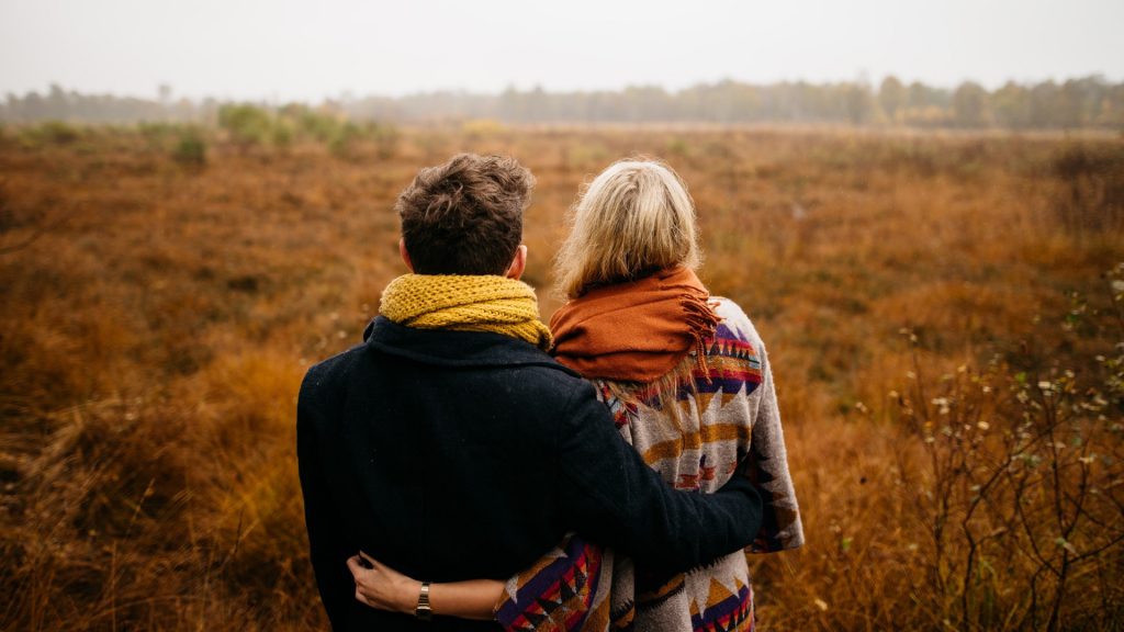 couple in autumn field