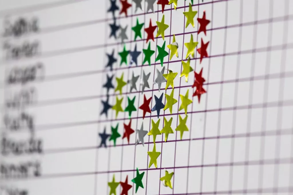 A star chart (like one from elementary school) with multi-colored stars on it.