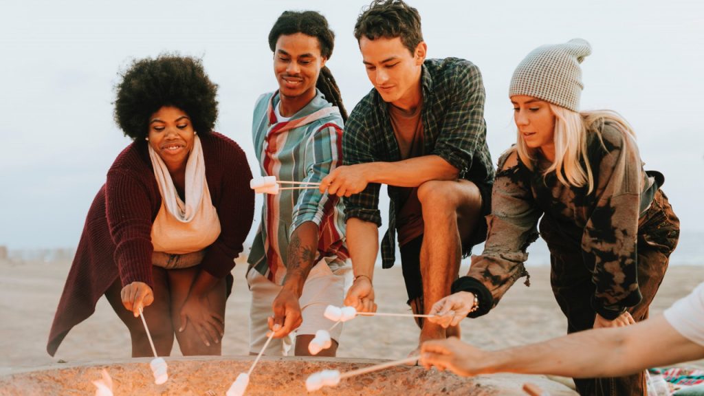 friends around a camp fire