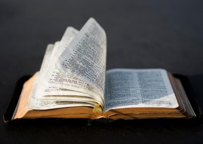 open bible with pages flipping