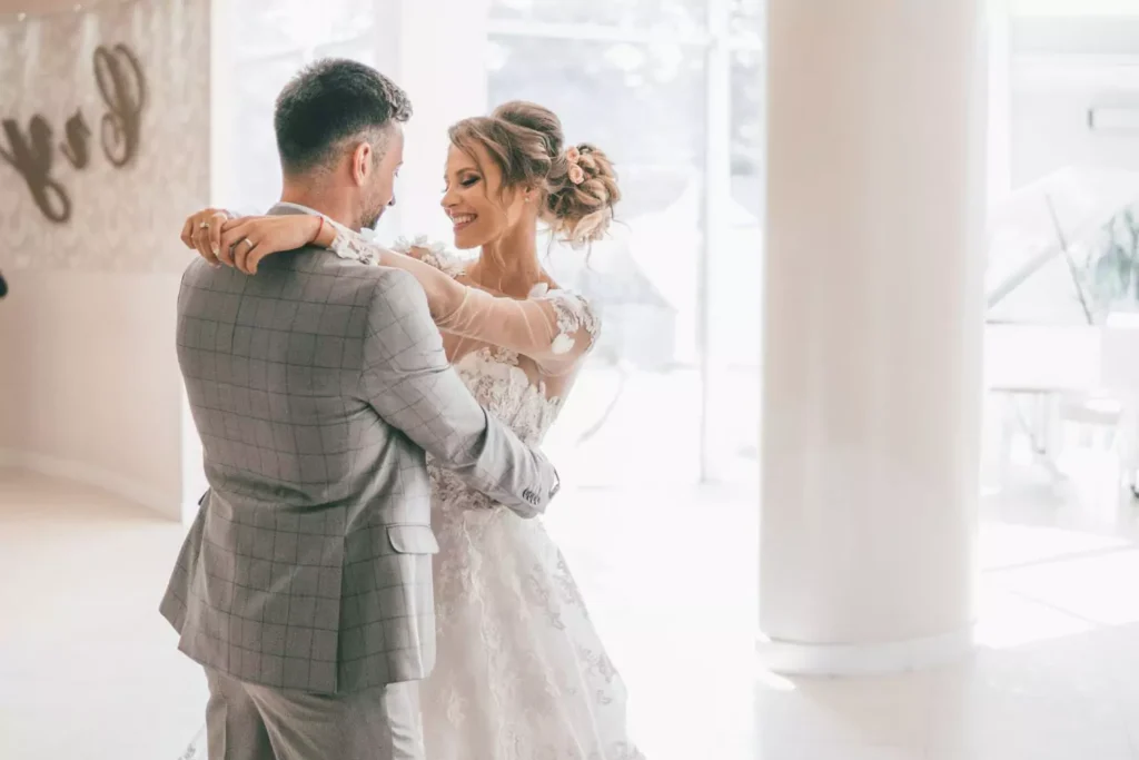 a couple who married in their 30s dancing at their wedding