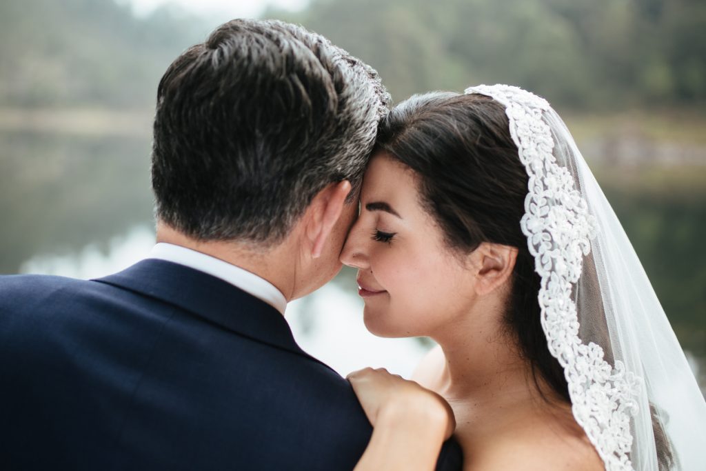 Head and shoulders shot of latin bride and groom