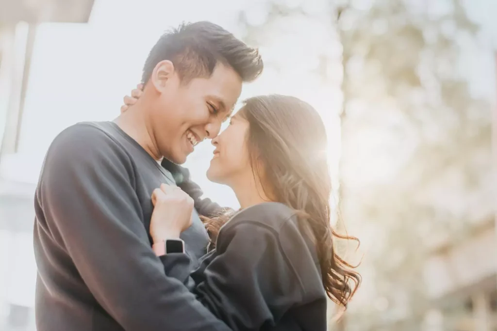 a man and woman embracing and smiling at one another - love worth fighting for