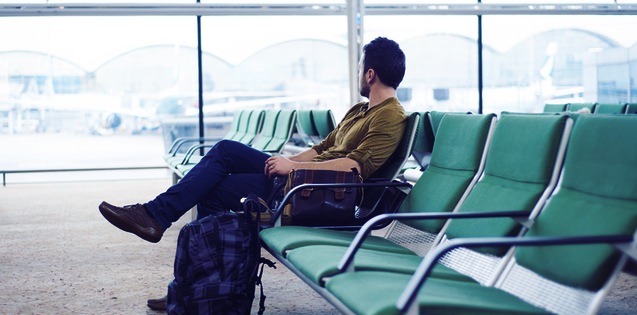 Young adult man in a waiting room