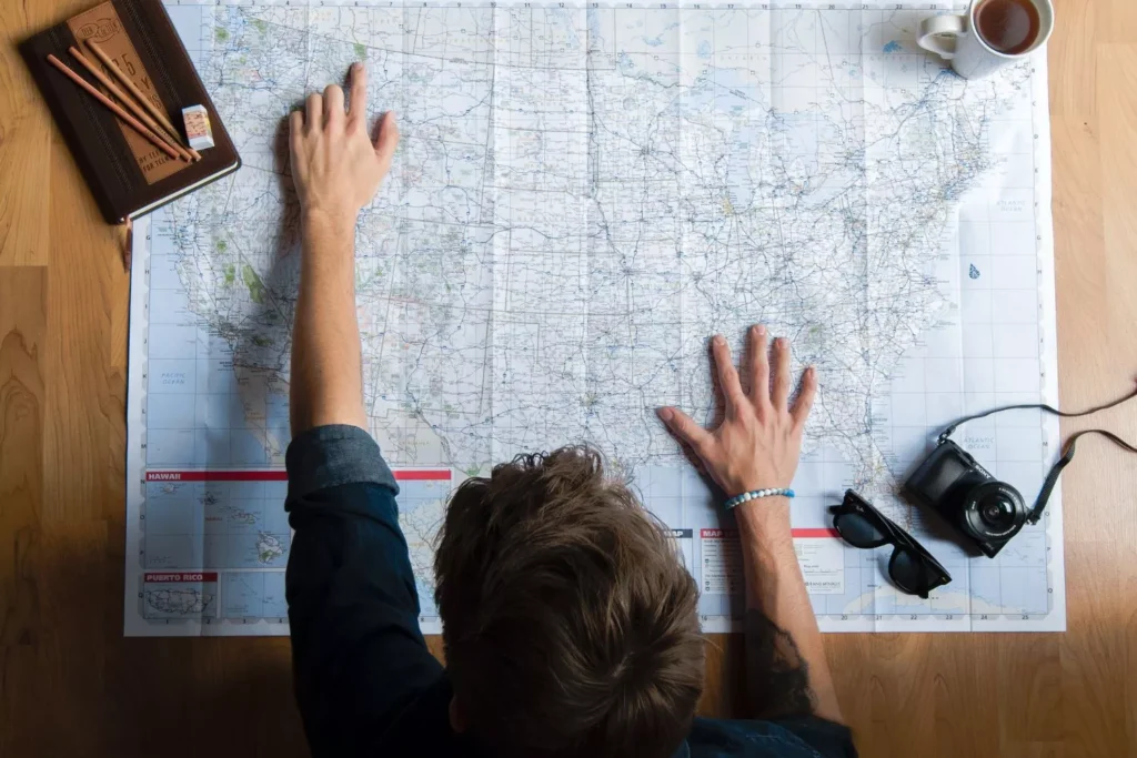 a man using a map as a guide