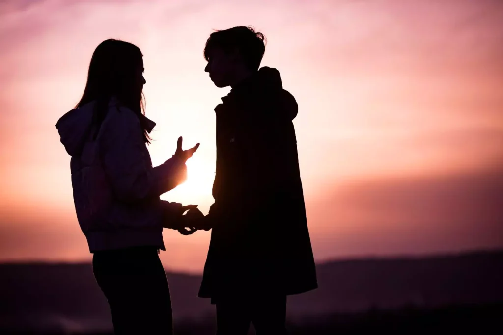 a woman and a man talking about their past