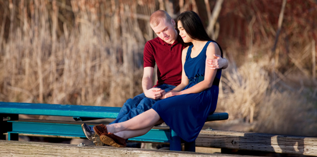 couple sitting on bench