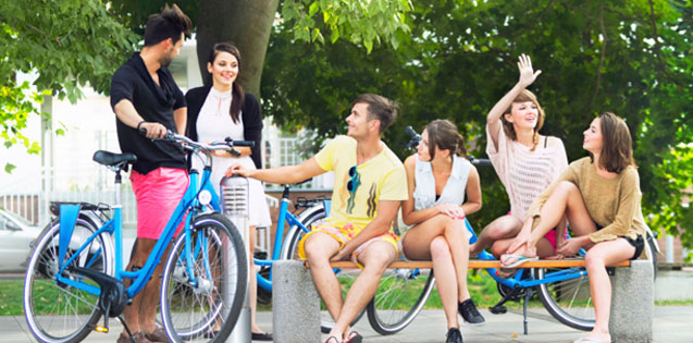 Happy group of young adults at the park