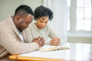 a couple praying for their marriage