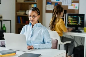 a woman working as at her engineering job - all work is God's work
