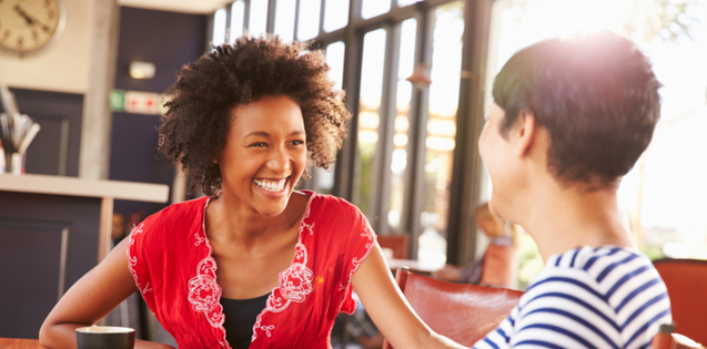 Two young adult women talking