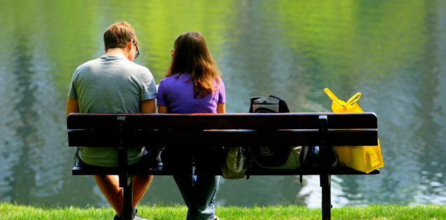 couple sitting on bench