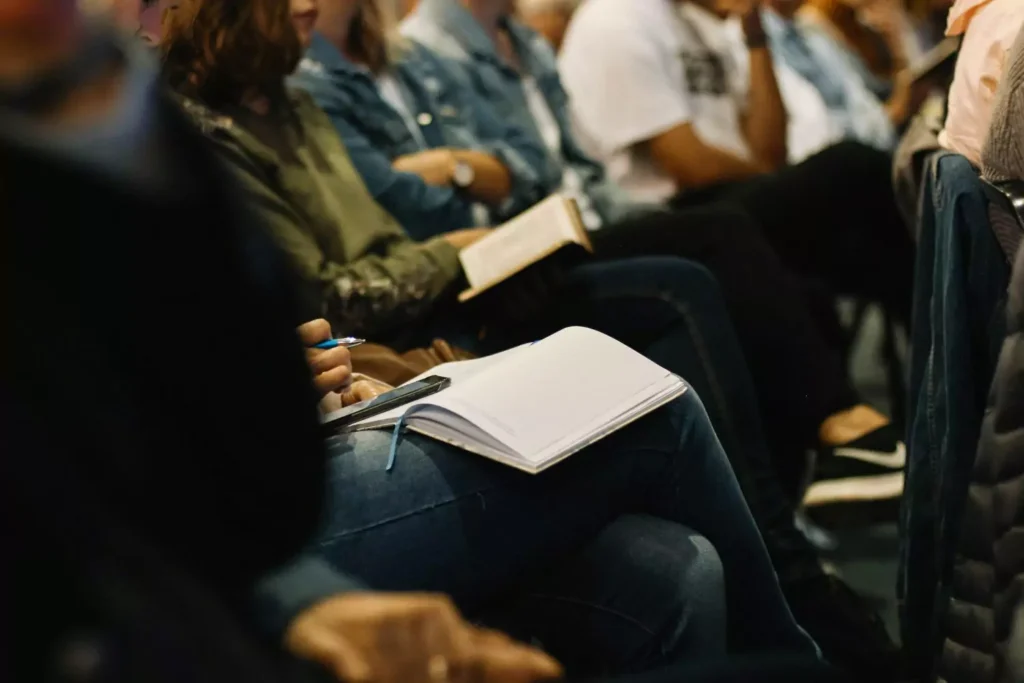 a person taking notes in church