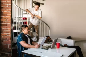 Male roommates chatting with one another