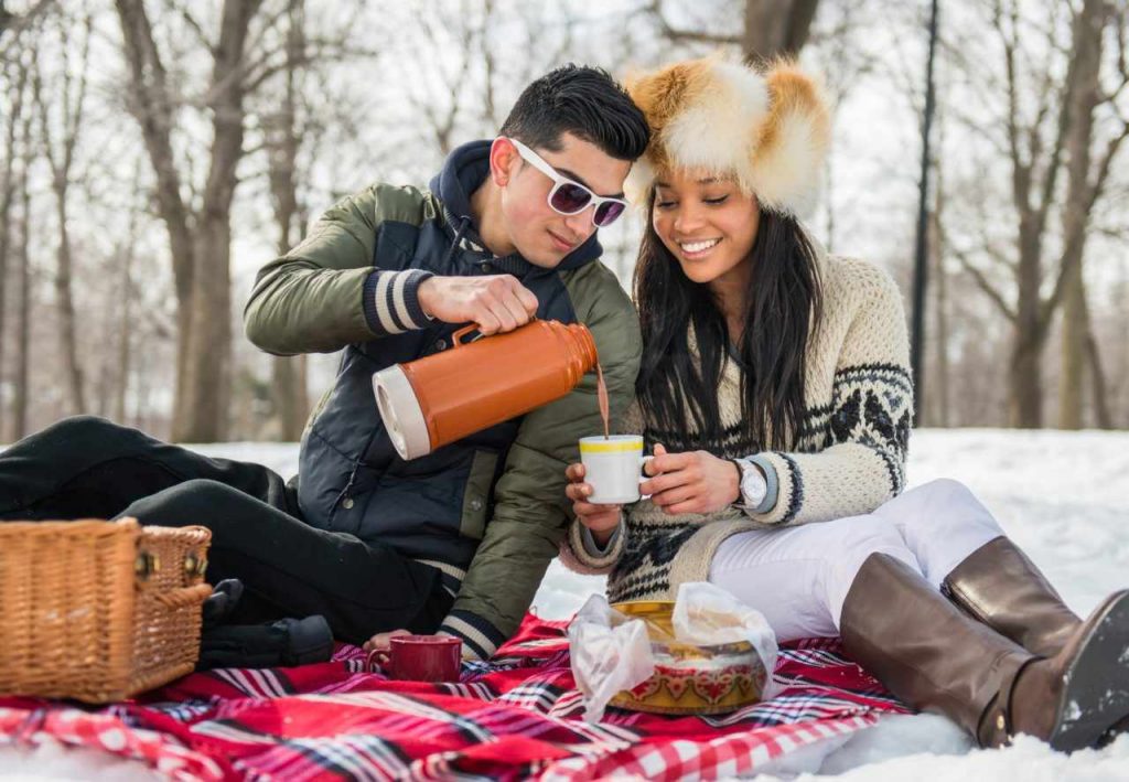 couple having a winter picnic