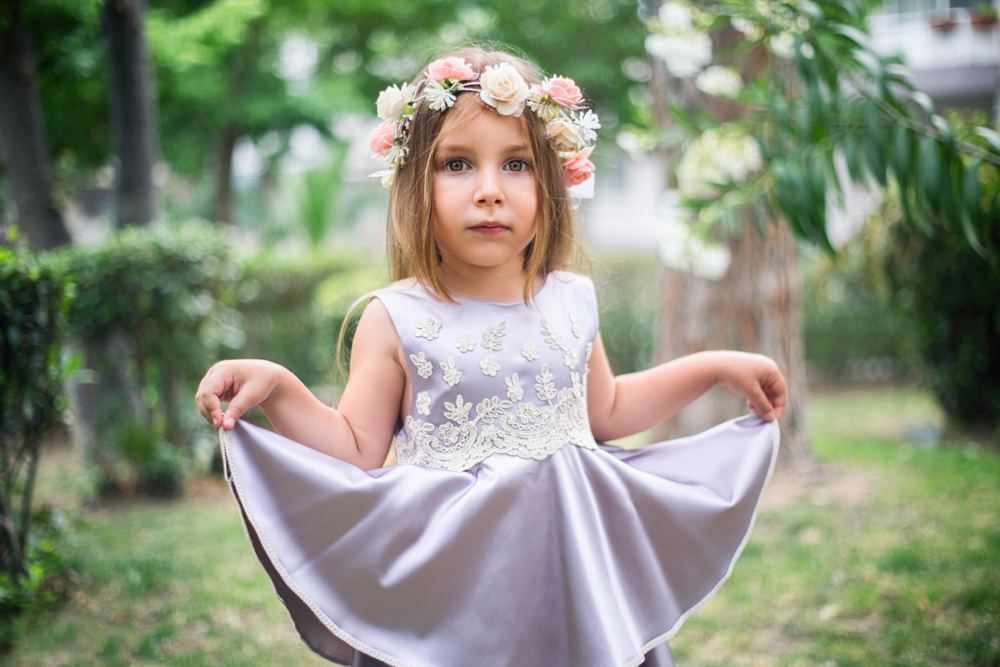 young girl in dress at wedding