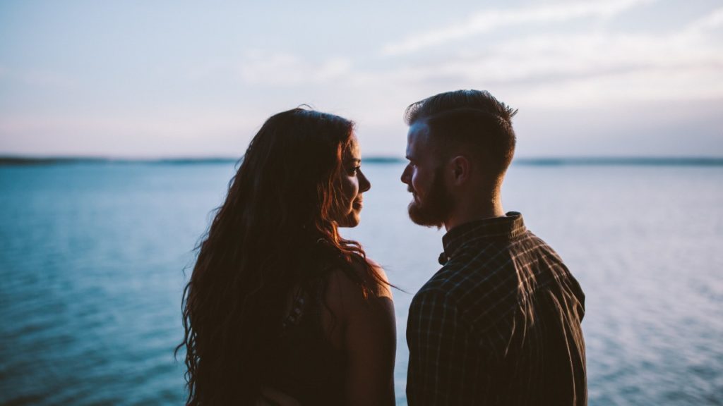 man and woman by water