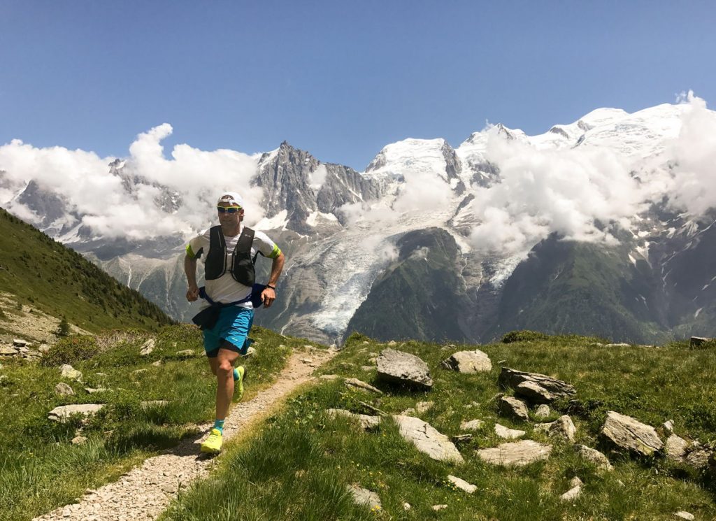 man running up mountain