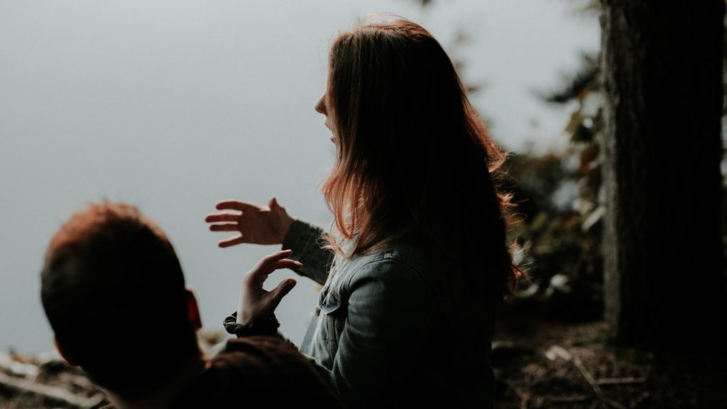 woman talking to man