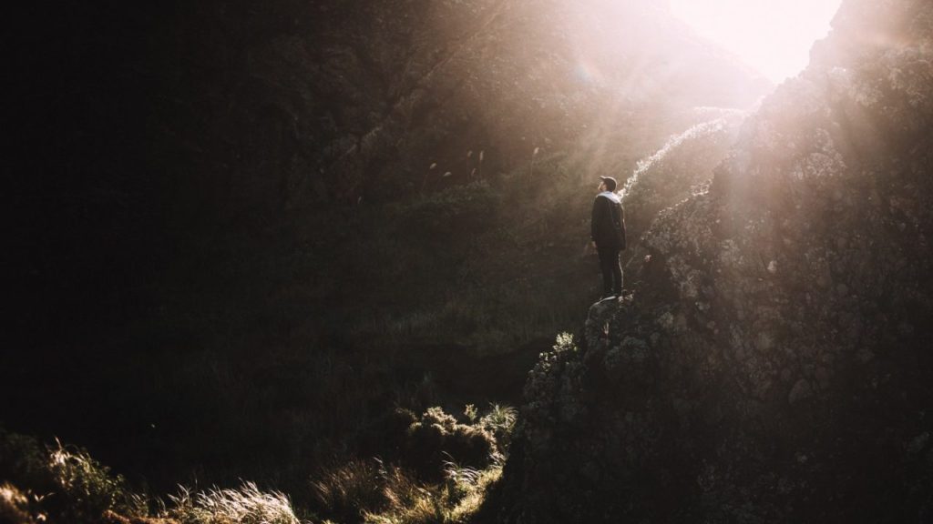 man in dark valley