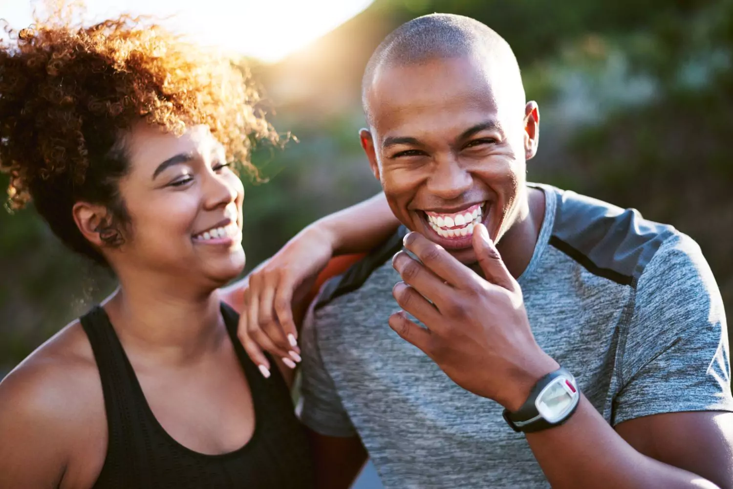 a couple smiling because they are in a healthy relationship