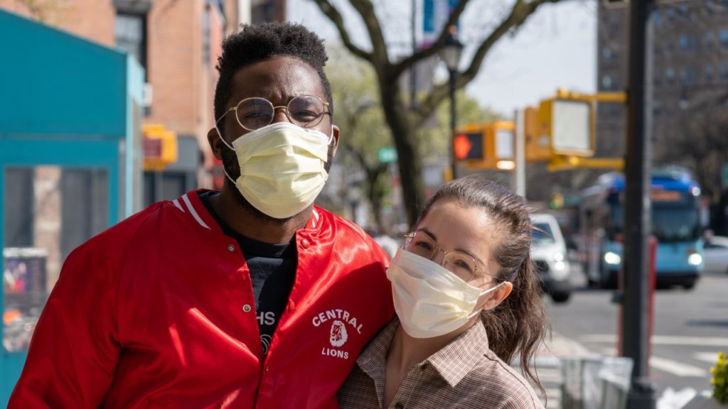 two people with masks