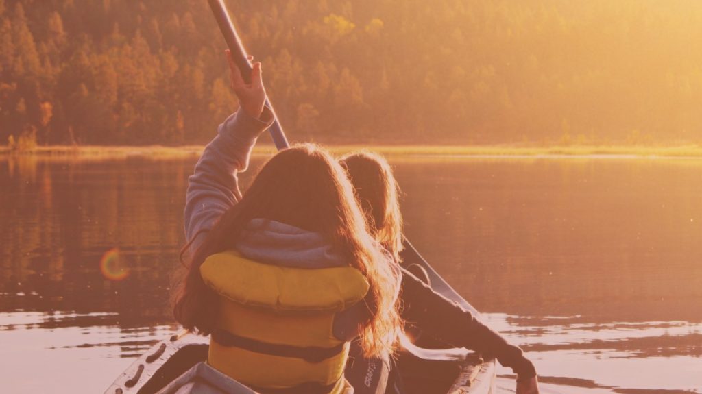 two women in canoe