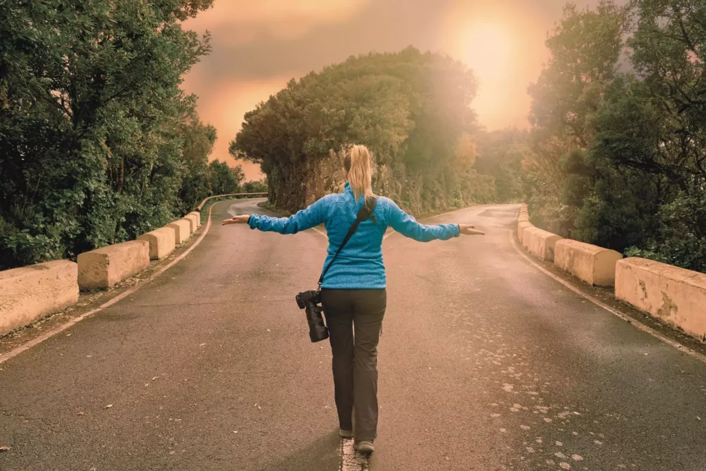 woman being indecisive about which road to take