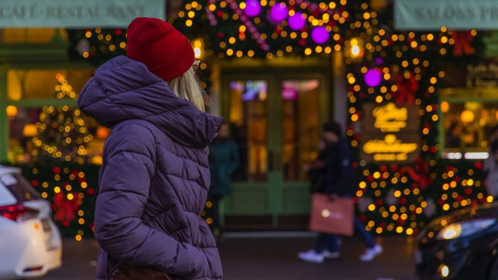 woman looking at christmas lights