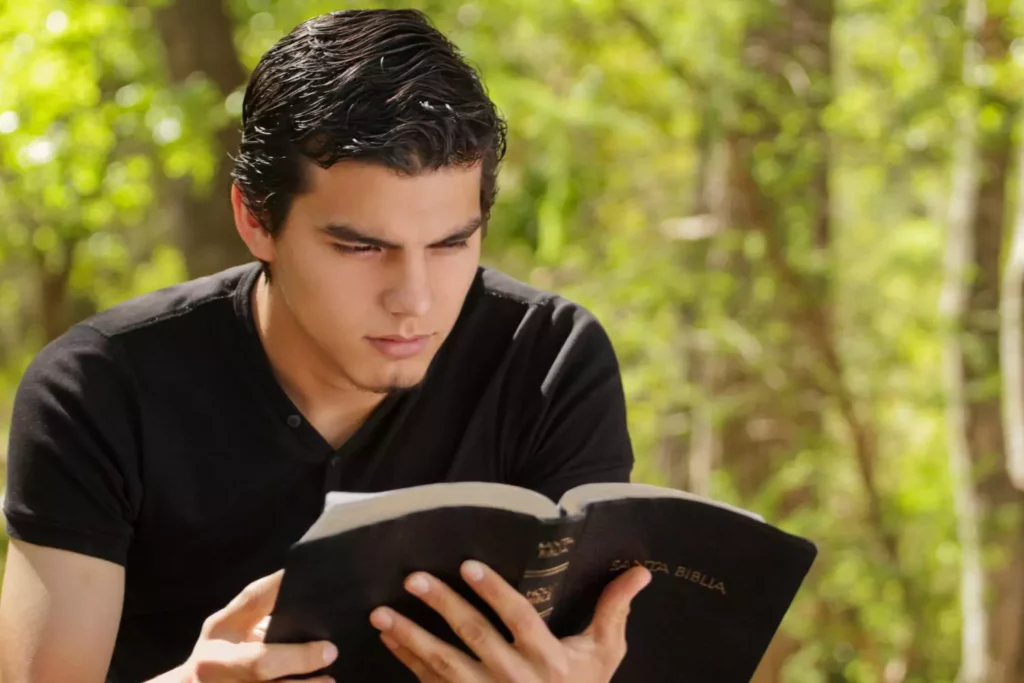 Guy reading his bible, reading strange passages in the bible