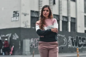 a woman crossing her arms representing cancel culture