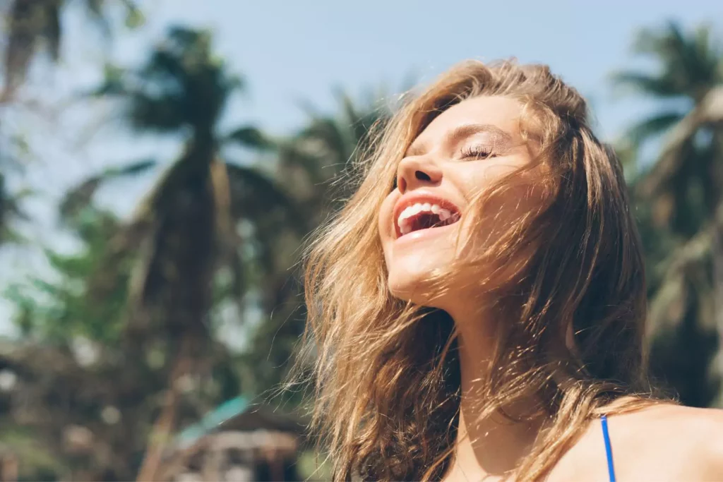 a woman smiling, happiness