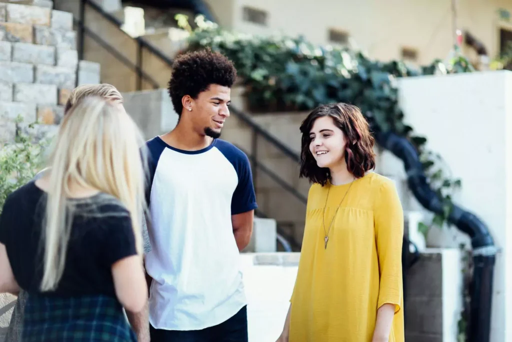 three friends talking about faith