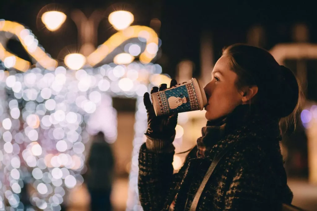 a woman drinking coffee, reminded of her alone-ness