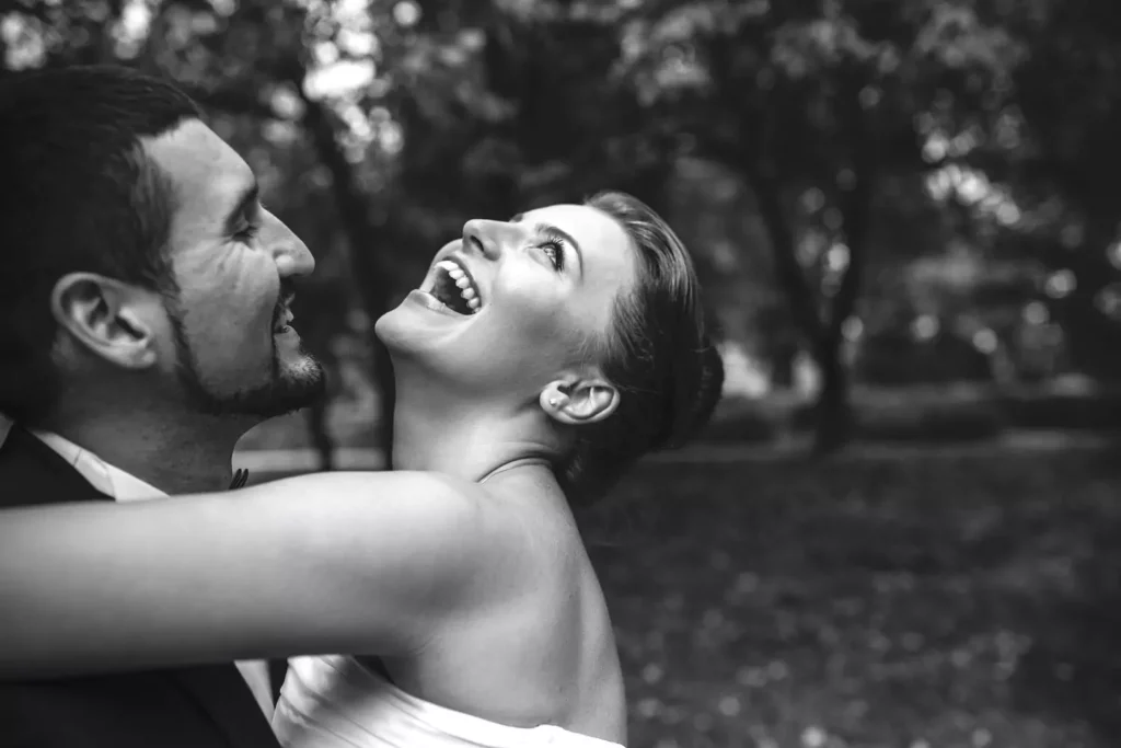 wife hugging her husband. Characteristic of a good spouse.