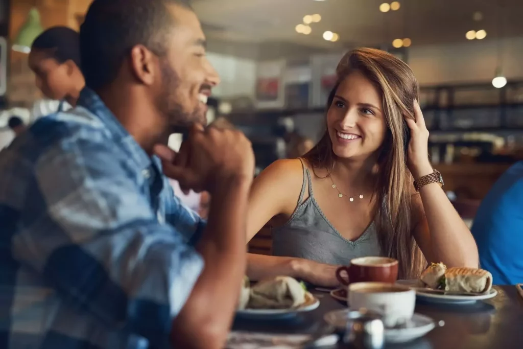 woman smiling looking at her date