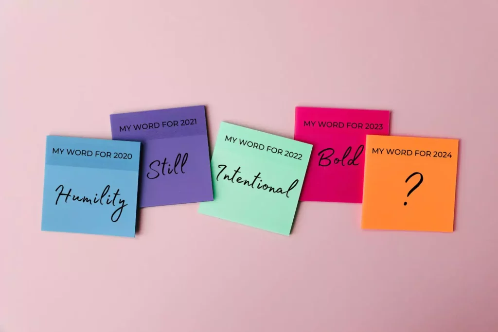 Sticky notes that say "my word for 2020" and other years
