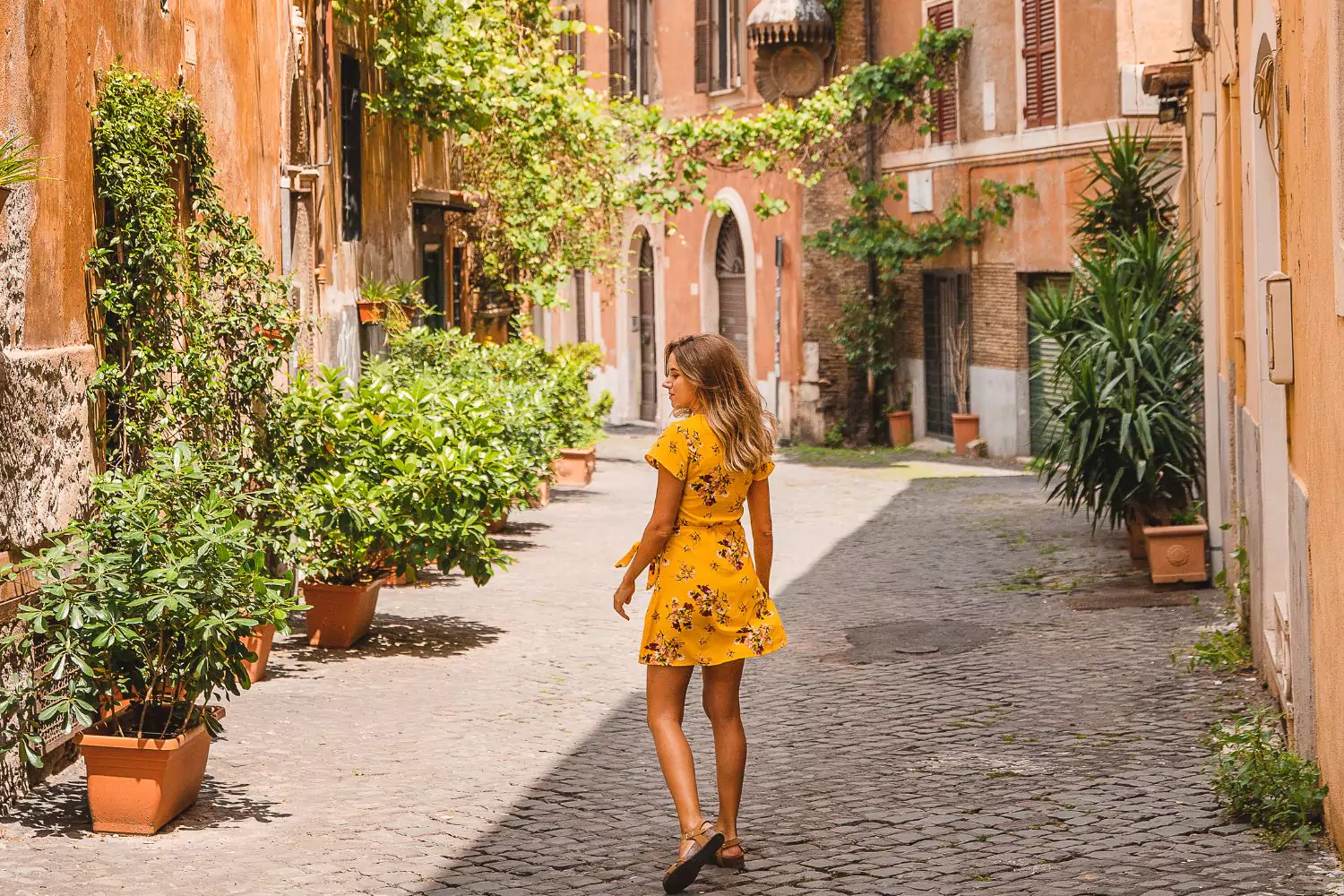 a woman walking in summer