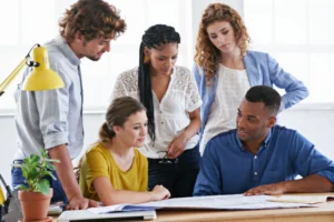 a group of people working together, what do people think of me