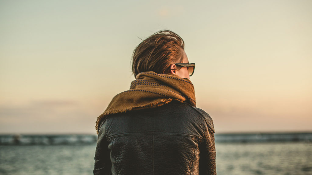 person looking out over ocean