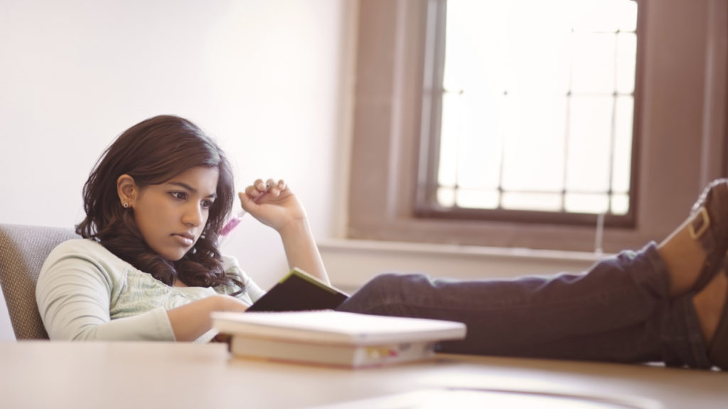 woman sitting contemplatively