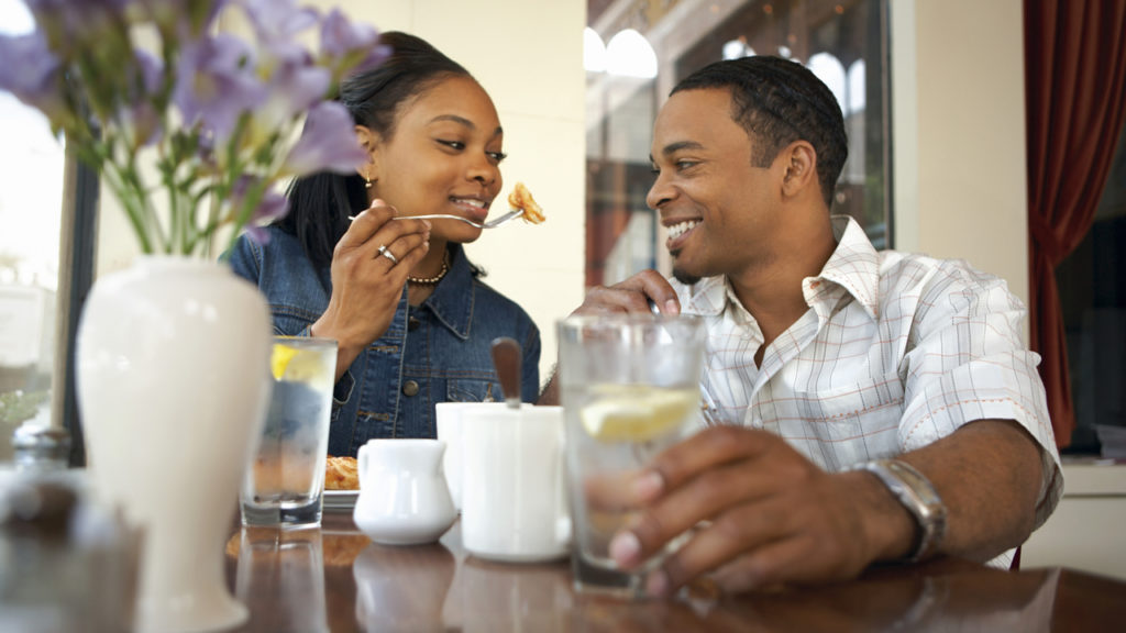 couple sitting at a restaurant table